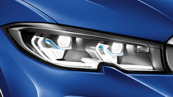 BMW 3 Series Sedan, BMW Laserlight. Lateral close-up of the left front headlight with BMW Laserlight.
