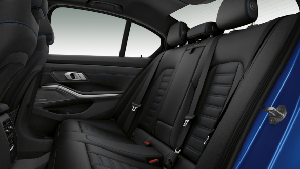 BMW 3 Series Sedan, seat heating. Lateral close-up of the rear seat row with seat heating front and rear.