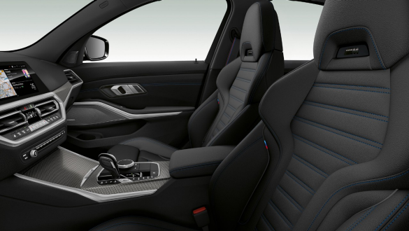 BMW 3 Series Sedan, sport seats. Close-up side view of the front row seats with black sport seats for driver and front passenger.