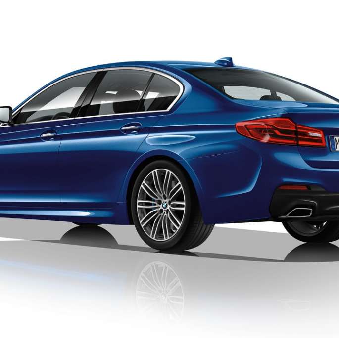 M Sport package three-quarter rear view BMW 5 Series Sedan 540i Sedan M Sport package BMW 5 Series Sedan 540i Sedan G30 Mediterranean Blue metallic three-quarter rear view