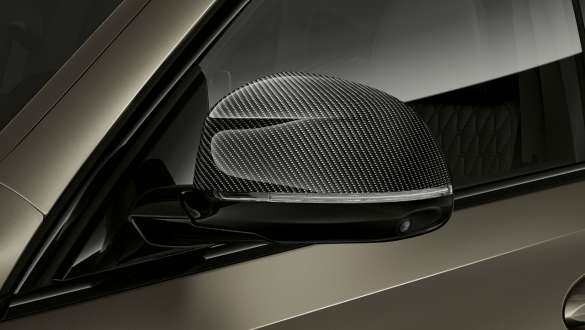 M Carbon mirror caps. BMW X6 with close-up on M Carbon mirror caps.