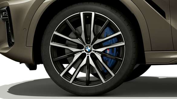 BMW X6 with focus on light alloy wheel. BMW X6 exterior with focus on light alloy wheel.