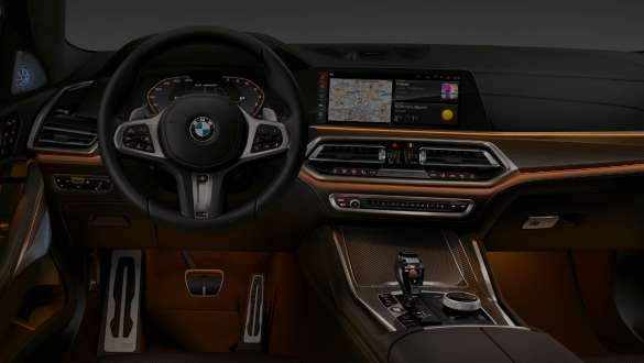 Cockpit with view of ambient light. BMW X6 cockpit with view of 12,3“ on ambient light.