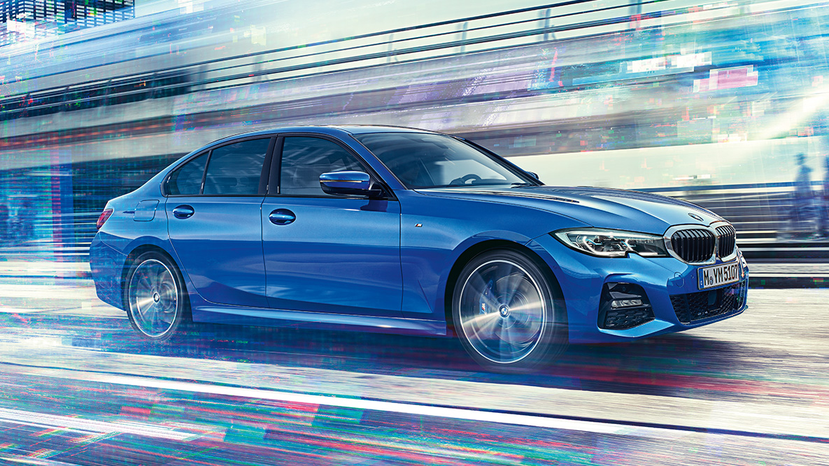 BMW 3 Series Sedan (G20), driving side view. Driving shot of the BMW 3 Series Sedan (G20) from the side on the day in an urban setting.