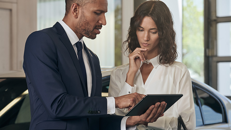 BMW employee advises a customer