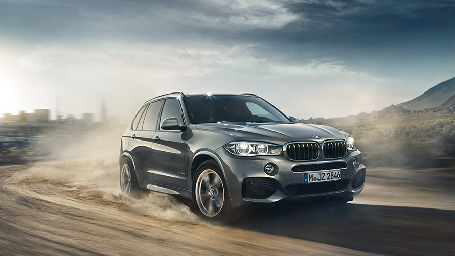 BMW X5 F15 third generation three-quarter front view driving BMW X Series BMW X5 F15 third generation three-quarter front view driving