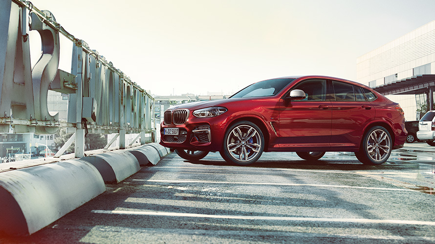 BMW X4 M40i G02 2018 Flamenco Red brilliant effect side view