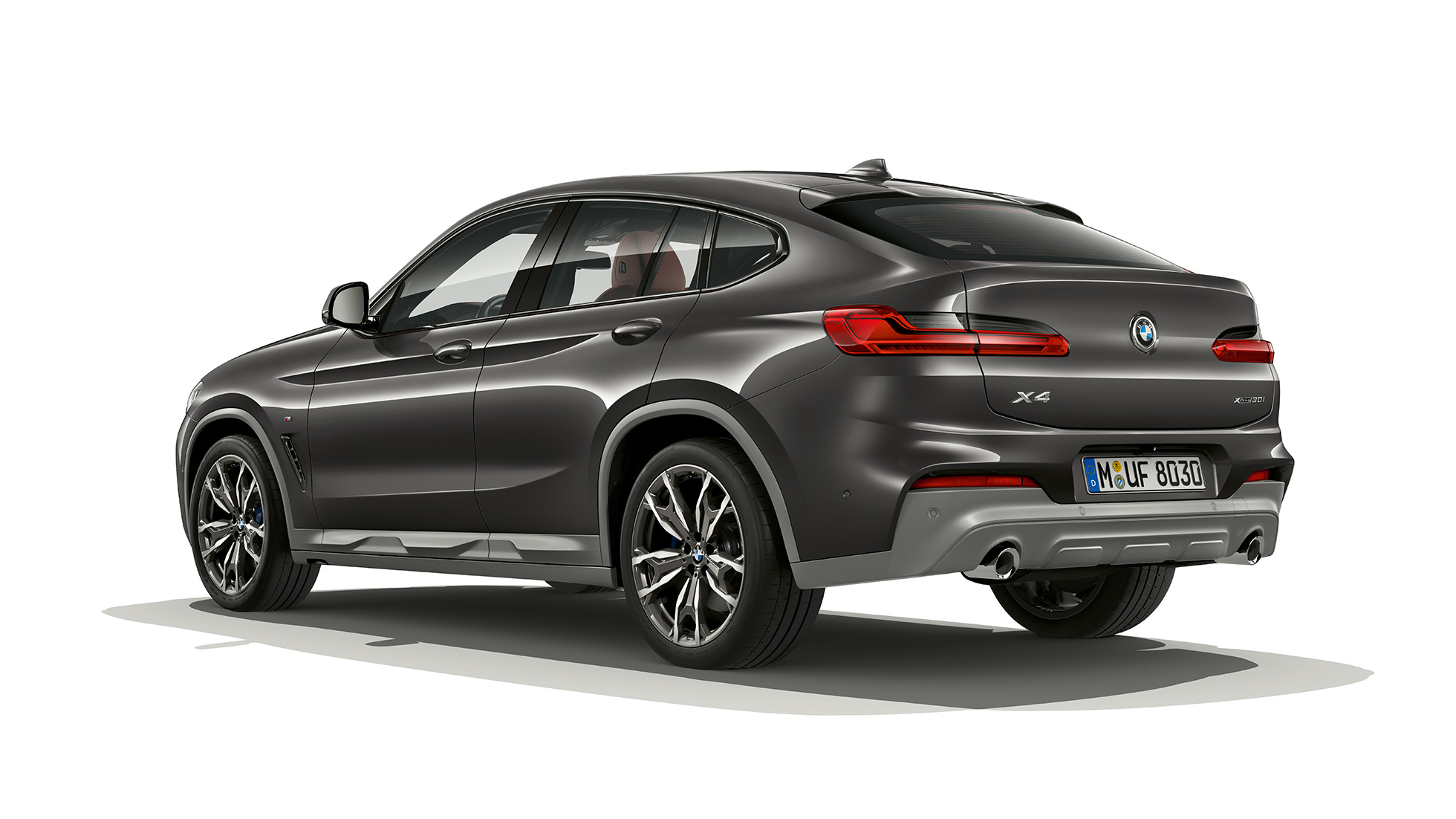 Three-quarter rear view BMW X4 Model M Sport X BMW X4 xDrive30i Model M Sport X G02 2018 Sophisto Grey brilliant effect three-quarter rear view