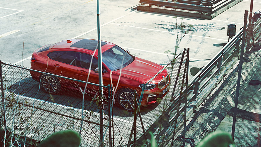 BMW X4 G02 2018 Flamenco Red brilliant effect parking on parking deck bird’s eye view