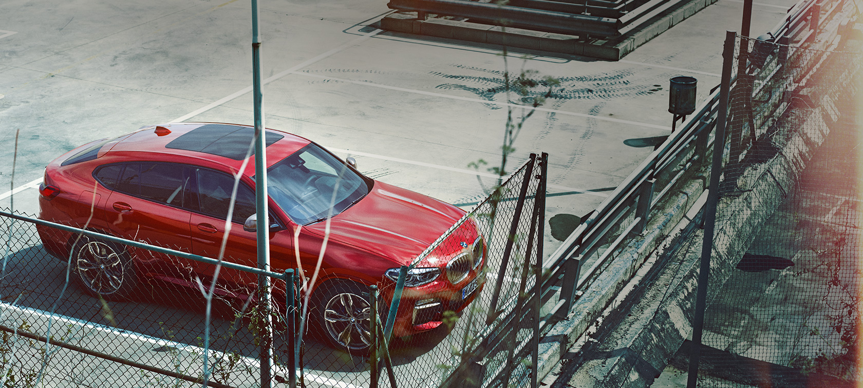 BMW X4 parking BMW X4 G02 2018 Flamenco Red brilliant effect parking on parking deck bird’s eye view