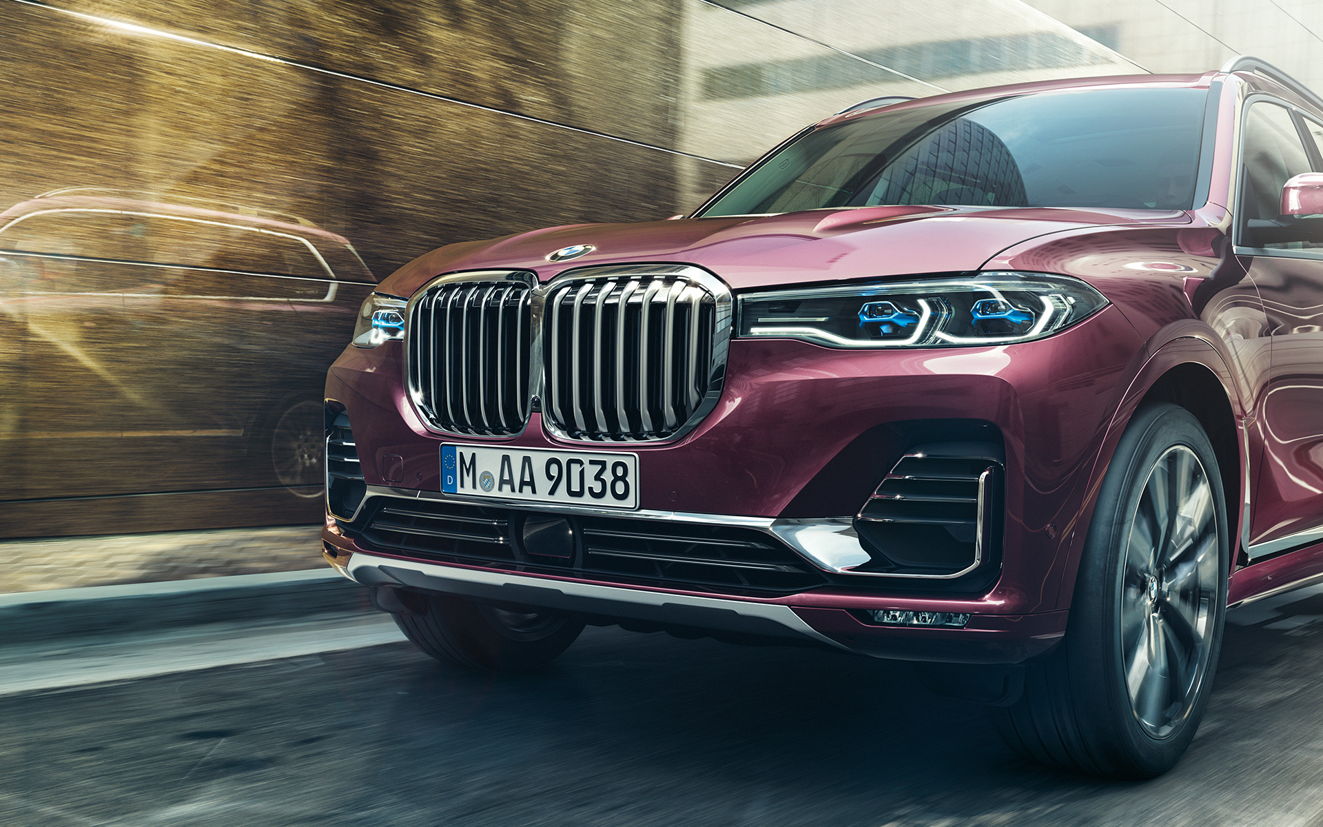 BMW X7 Individual xDrive40i G07 2018 ametrin metallic three-quarter front view driving 