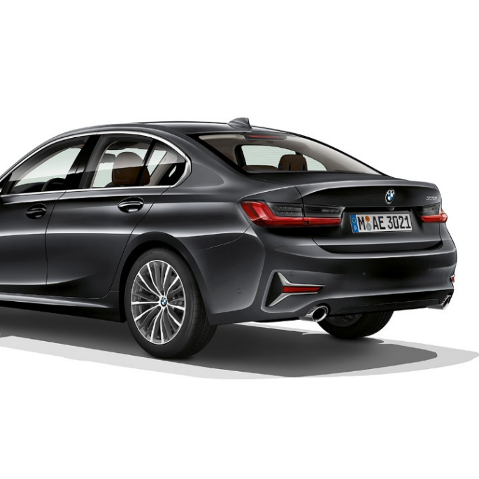 BMW 3 Series Sedan, Model Luxury Line rear. Three-quarter rear shot of the BMW 3 Series Sedan with Model Luxury Line features.