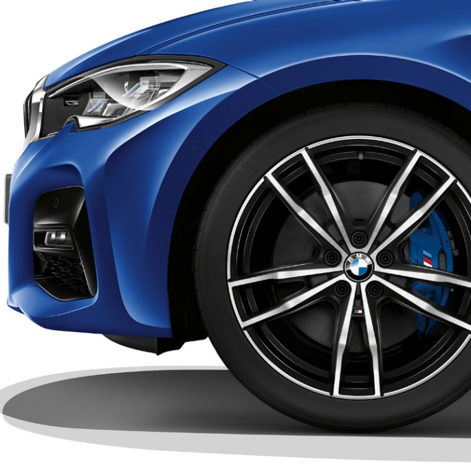 BMW 3 Series Sedan, Model M Sport light alloy wheel. Close-up of the light alloy wheel of the BMW 3 Series Sedan with Model M Sport equipment.