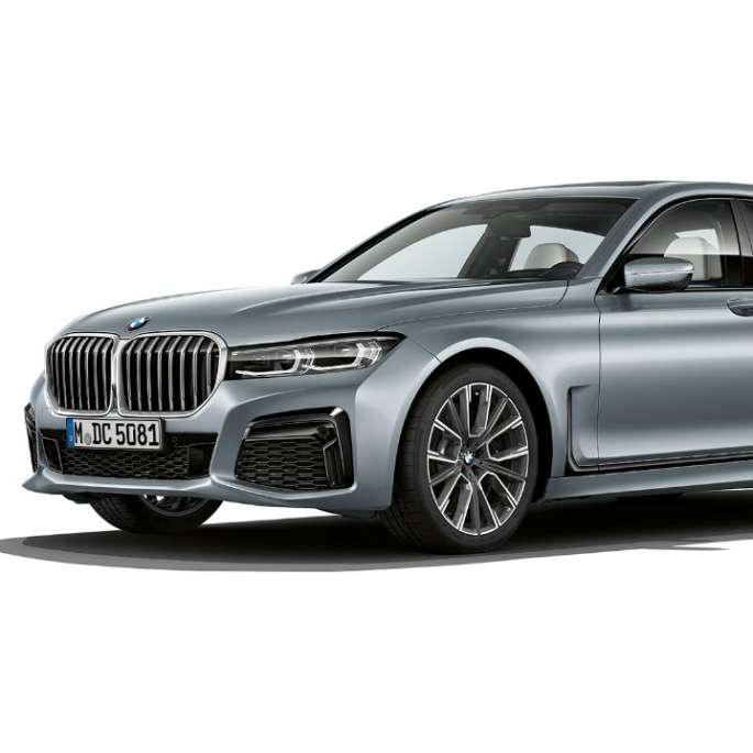 BMW 7 Series Sedan M Sport package, three-quarter front view Grey BMW 7 Series Sedan M Sport package in three-quarter front view
