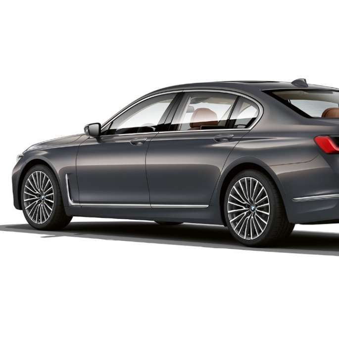 BMW 7 Series Sedan with Exterior Design Pure Excellence, three-quarter rear view Grey BMW 7 Series Sedan with Exterior Design Pure Excellence in three-quarter rear view